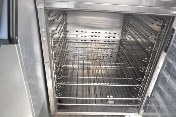 Wittco 1001 Commercial Heated Holding Cabinet, stainless steel, multiple wire racks, on casters, 208/240V, 1 Phase.