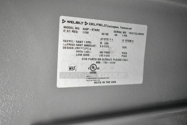 2019 Delfield 406P-STAR2 commercial cooler label; model, serial number, 115V, 1 phase, refrigerant details visible.