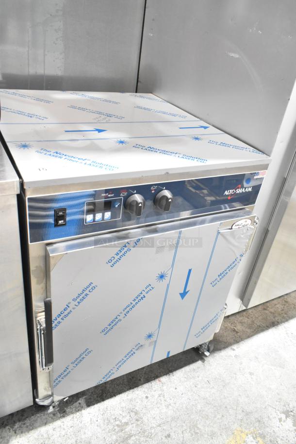 2023 Alto Shaam 750-TH/II Commercial Cook and Hold Oven on casters, 120V, 1 Phase, with control panel and protective film.