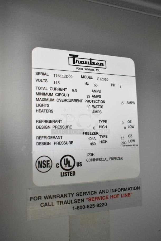 Traulsen G12010 commercial freezer label, model G12010, showing electrical specs, 115 volts, 1 phase. NSF, UL listed.