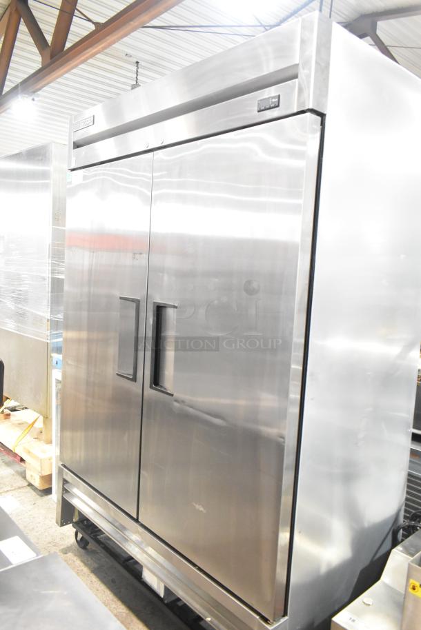 2019 True T-49F-HC commercial two-door reach-in freezer, stainless steel, on casters, 115V, 1 phase.