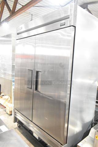 2019 True T-49F-HC commercial two-door reach-in freezer, stainless steel, on casters, 115V, 1 phase.