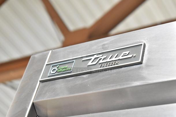 2019 True T-49F-HC commercial freezer, stainless steel, natural refrigerant label, two-door, on casters, 115V, 1 phase.