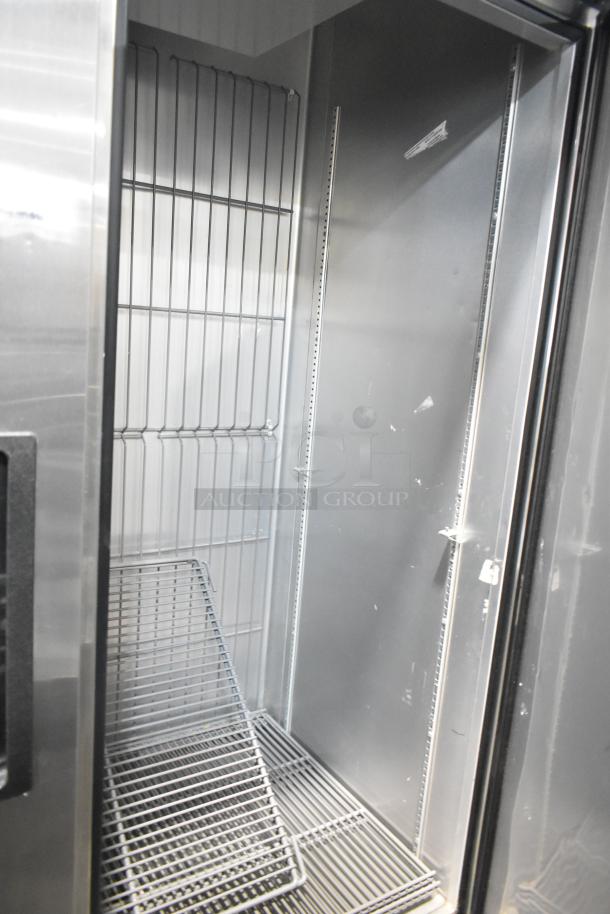 2019 True T-49F-HC 2 Door Reach-In Freezer, stainless interior, on commercial casters, 115V, 1 Phase, excellent condition.