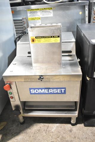 Somerset CDR-170 dough sheeter, commercial countertop model, 110V, 1 phase, stainless steel, visible caution labels.