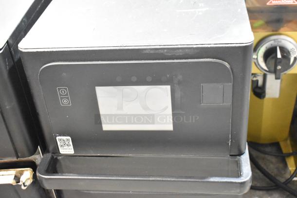 2022 Merrychef eikon e2s high-speed cooking oven, black, touchscreen control, 208/240V, 1 Phase, used condition.
