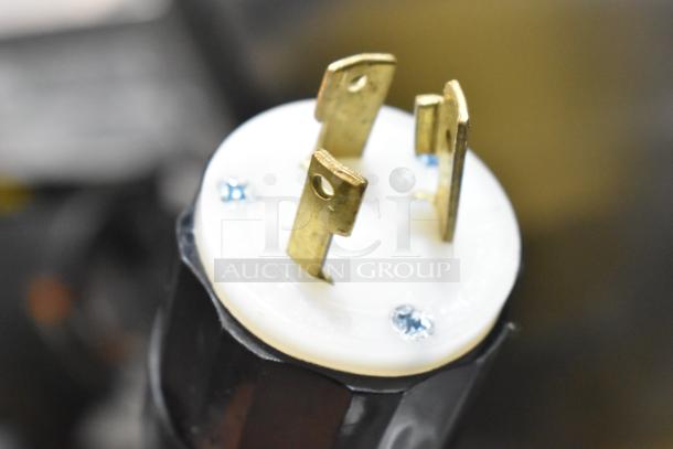 NEMA electrical plug with gold prongs, part of LavAzza commercial countertop espresso machine, 208/240 Volts, 1 Phase.