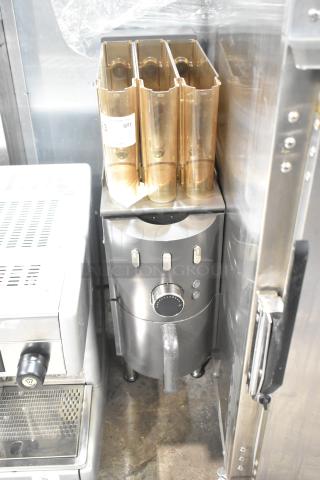 Commercial countertop coffee tower machine with multiple clear compartments and control knobs. Slightly used condition.