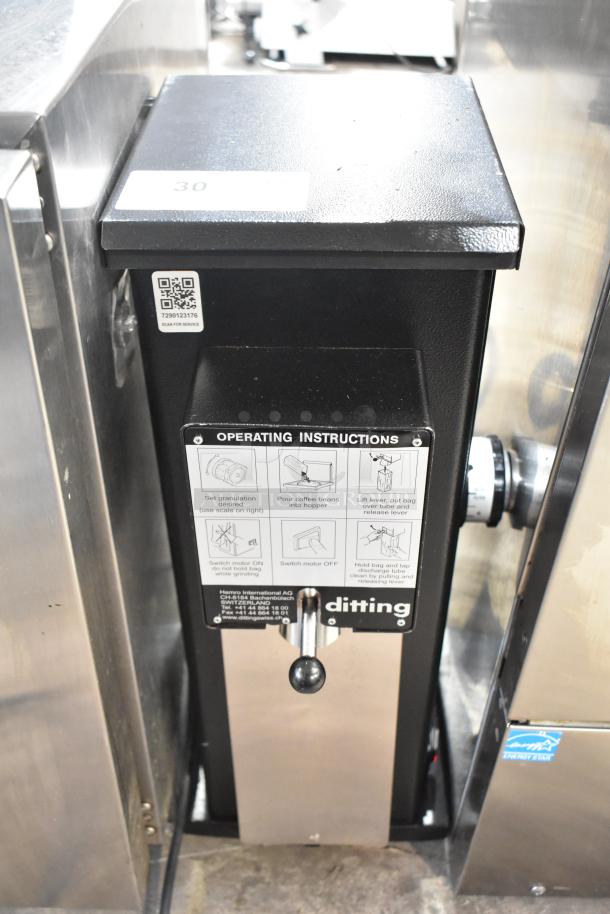 2019 Ditting KR1203 coffee grinder, black, commercial use, 120 volts, operating instructions visible, excellent condition.
