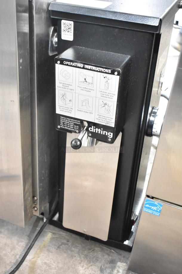 2019 Ditting KR1203 coffee grinder, black with operating instructions; 120V, used condition, countertop model.