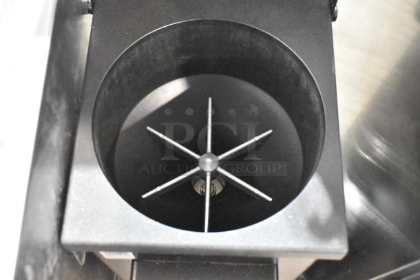 2019 Ditting KR1203 coffee grinder chute view, commercial model, 120 volts, excellent condition, visible grinding mechanism.