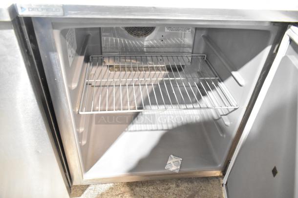 2019 Delfield 406P-STAR2 undercounter cooler with single door, interior shelf, and commercial casters. 115V, 1 Phase.