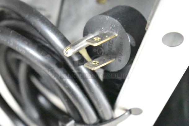 2019 Delfield 406P-STAR2 undercounter cooler plug, 115V, 1 phase, showing standard electrical prongs.