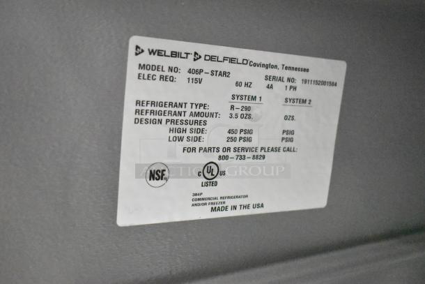 2019 Delfield 406P-STAR2 undercounter cooler label showing model, serial number, voltage, refrigerant type, and NSF certification.