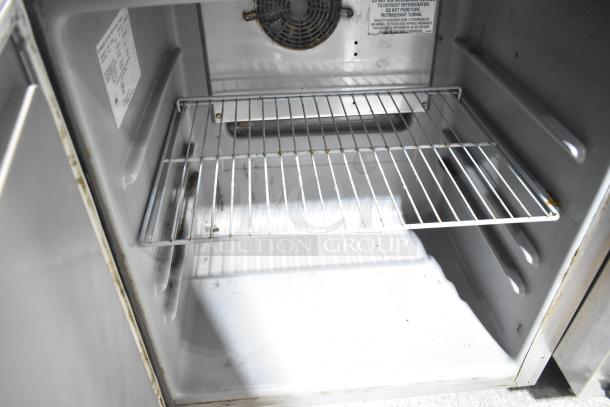 2019 Delfield 406P-STAR2 undercounter cooler, single door, interior view with shelf, 115V, 1 phase, commercial use.