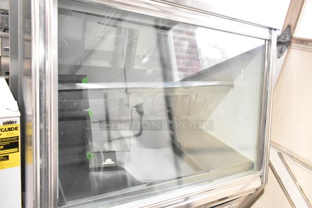 Leader Commercial Floor Style Deli Display Case Merchandiser, 115V, 1 Phase, glass front, stainless steel frame, interior shelving.