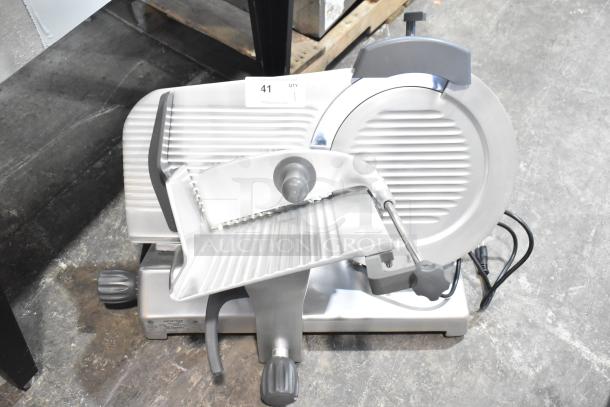 BRAND NEW Hobart EDGE14-11 manual meat slicer, 14" blade, countertop model, with blade sharpener. Scratch and dent condition.