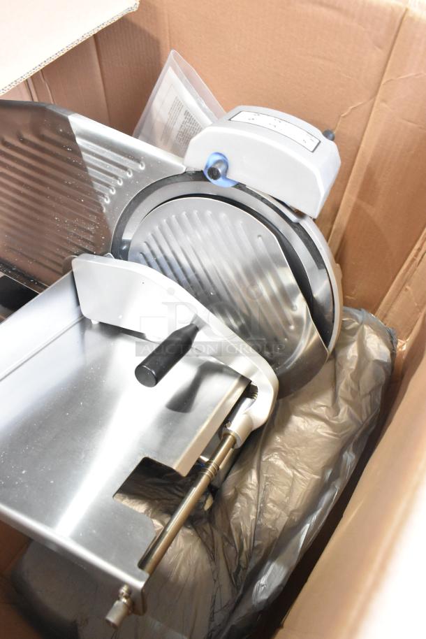 Brand new Pro-cut KDS-10-DC meat slicer in packaging, featuring 14" blade, blade sharpener; 115V, 1 phase.