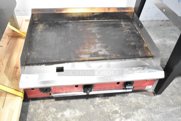 2025 Avantco 177CAG36TG commercial countertop griddle, natural gas powered, flat top, used condition, visible wear.