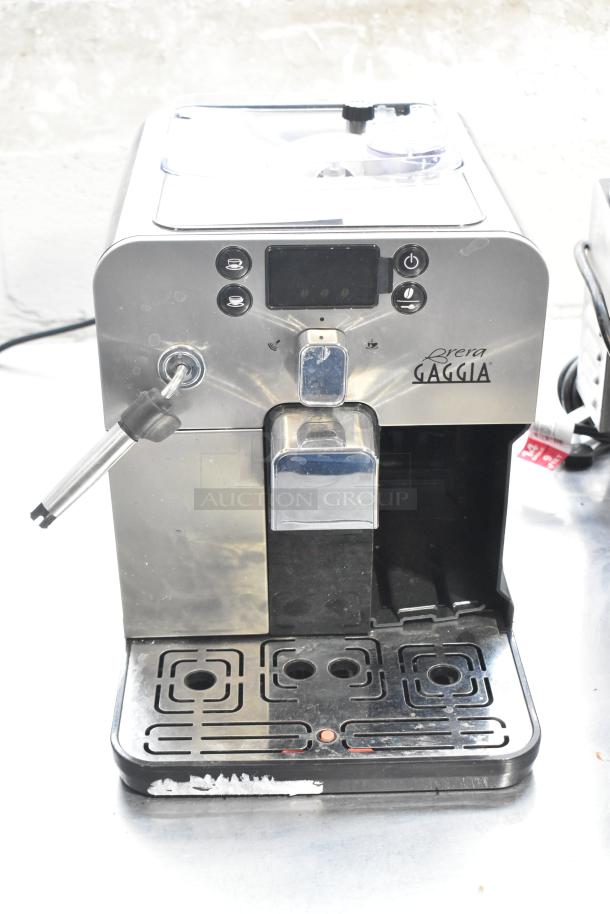 Gaggia Brera Super-Automatic Espresso Machine, stainless steel, 115V, 1 Phase, visible control panel and steam wand, good condition.