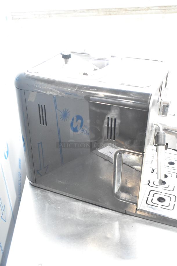 Gaggia Brera Super-Automatic Espresso Machine, 115V, 1 Phase, stainless steel. Slight surface wear visible.