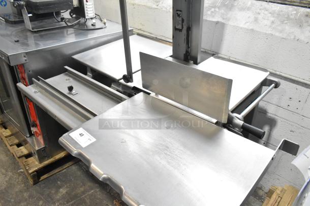 Hobart 6801 Commercial Meat Saw, 3 Phase, 200-230 Volts, stainless steel, auction tag visible, in good condition.