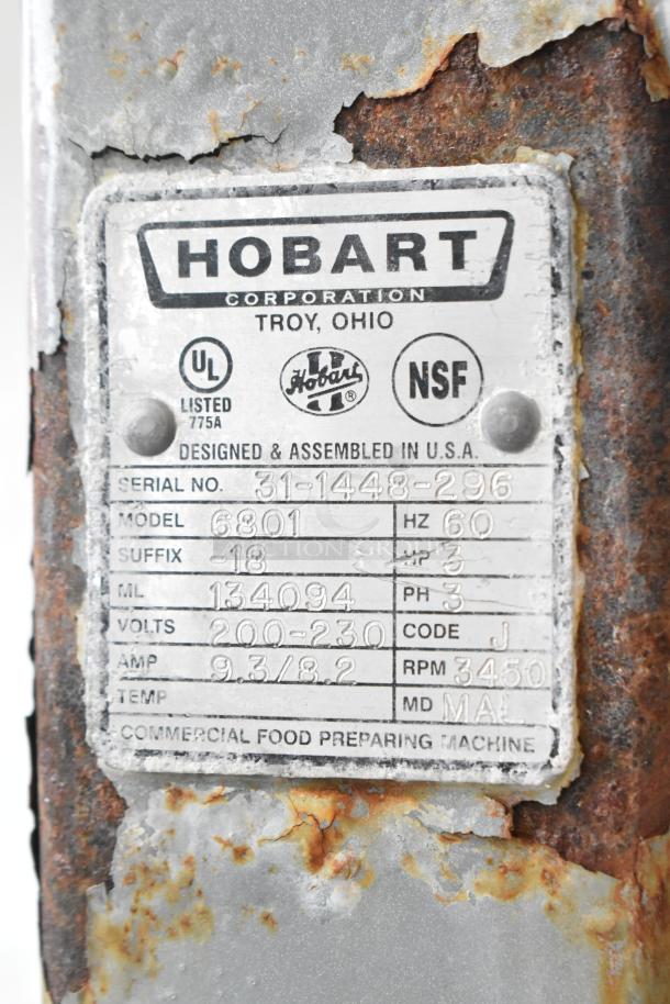Hobart 6801 Meat Saw label, 200-230V, 3 Phase. Serial No. 31-1448-296; shows rust and wear.
