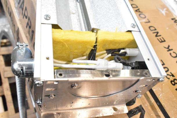 Brand new 2024 ServIt 423SW48THA 48" strip warmer. Features single toggle control, visible wiring, and metal casing. 120V, 1 phase.