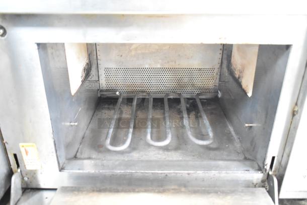 Amana AXP20 Commercial Countertop Oven interior, showing heating elements, some wear; 208/230 volts, 1 phase.