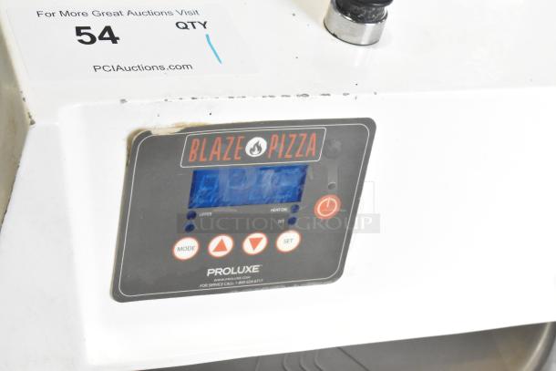 2021 Proluxe DP2350 commercial dough press, countertop model, 208 volts, 1 phase, Blaze Pizza branding, digital controls visible.