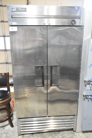 2019 True T-35 Commercial 2 Door Reach In Cooler, stainless steel, 115 Volts, 1 Phase. Visible True logo on top.
