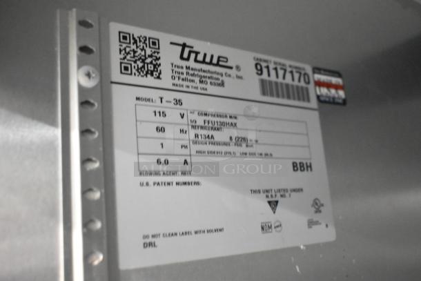 Label on 2019 True T-35 Commercial 2 Door Cooler, displaying model, voltage (115V), phase (1), refrigerant (R134A), and serial details.