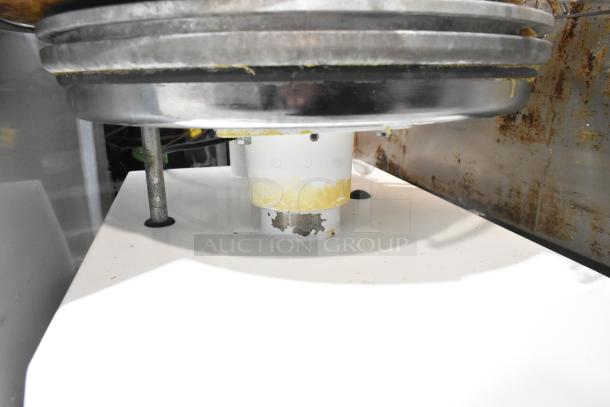 2021 Proluxe DP2350 Dough Press, commercial countertop model. Visible wear, 208V, 1 Phase. Metal and plastic components.