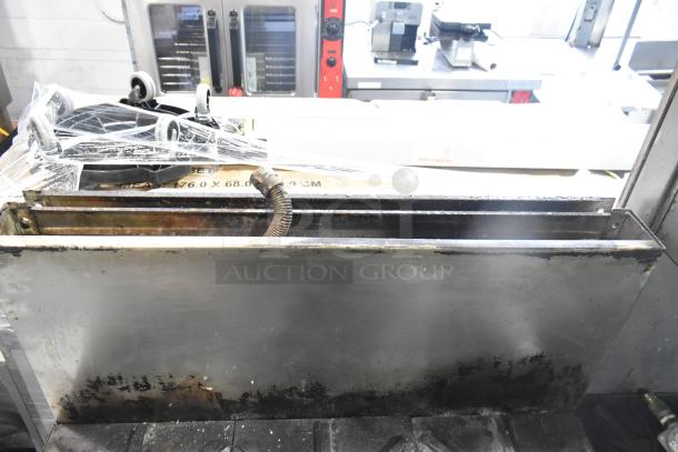 Jade Range commercial gas-powered 6 burner, 2 tier range with oven, back splash, and casters. Some wear visible.