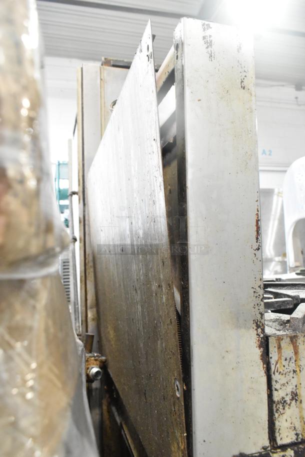 Jade Range commercial gas 6-burner, 2-tier range with oven, back splash, on casters. Visible wear and rust.