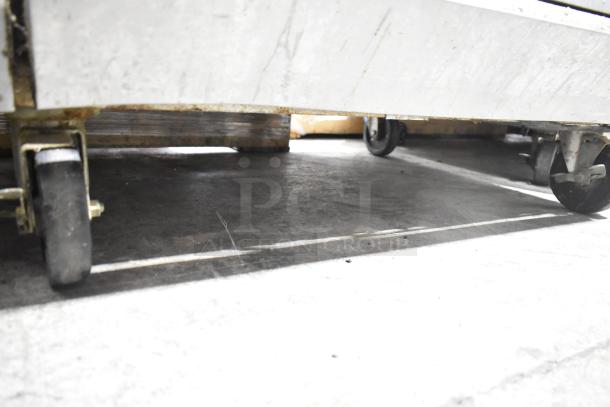 Southbend commercial range casters, showing wheels and underside, indicating mobility and durability of the equipment.