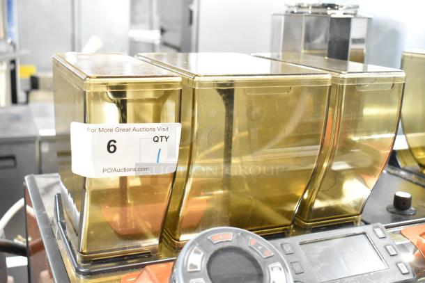 Thermoplan Mastrena Super Automatic Espresso Machine, commercial countertop model, 250V, with labeled containers.