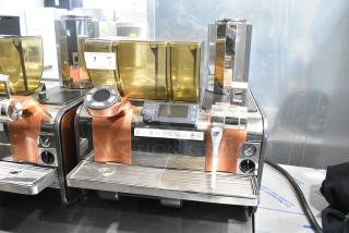 Thermoplan Mastrena super automatic espresso machine, commercial countertop model, 250V, stainless steel, digital display.