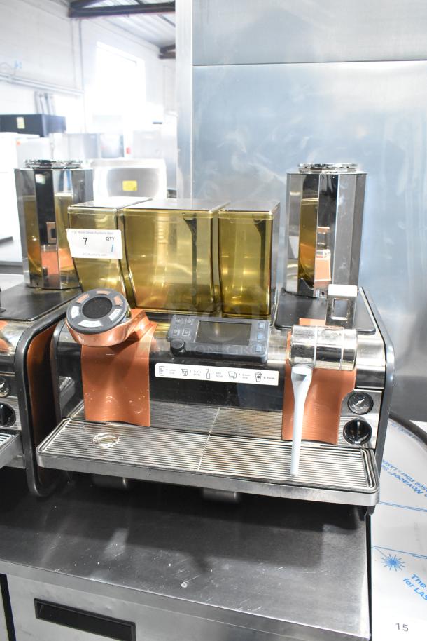 Thermoplan Mastrena commercial espresso machine, 250V, countertop model. Includes digital display and sleek metallic finish.