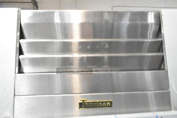 Traulsen G10042-032 half-door cooler, stainless steel, new scratch and dent. Comes with commercial casters, 115 volts, 1 phase.