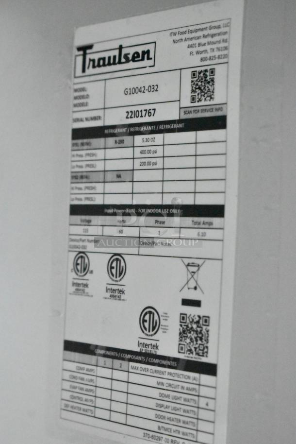 Label for Traulsen G10042-032 cooler, showing specifications and certifications. Model, serial number, and voltage details listed.