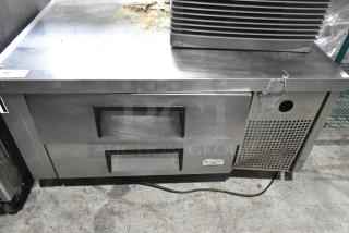 Commercial 2 Drawer Chef Base on casters, stainless steel, 115 volts, 1 phase. Shows signs of use, scratch and stain marks visible.