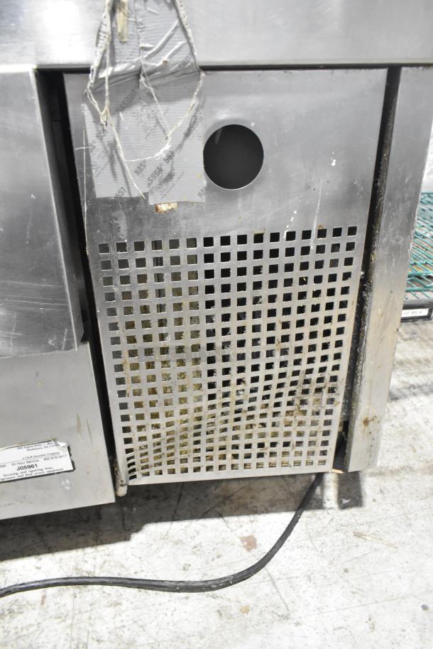 Commercial 2 drawer chef base on casters, stainless steel, 115 volts, 1 phase, visible vent holes, fair condition.