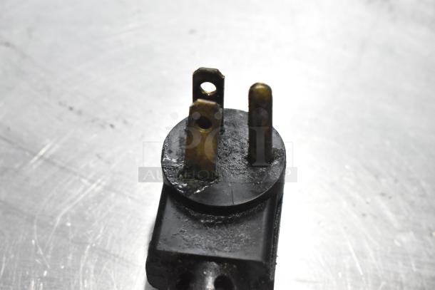 Close-up of a power plug for a Commercial 2 Drawer Chef Base on Commercial Casters, 115 Volts, 1 Phase.