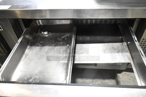Commercial 2 Drawer Chef Base on casters, stainless steel, 115 volts, 1 phase, with visible wear.