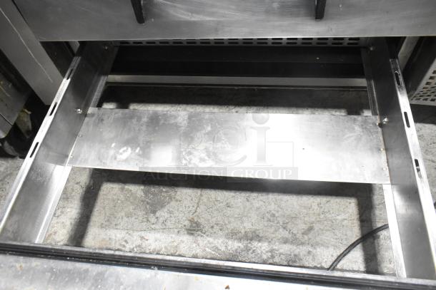 Commercial chef base with 2 drawers on casters, 115 volts, 1 phase, stainless steel, good condition, suitable for professional kitchens.