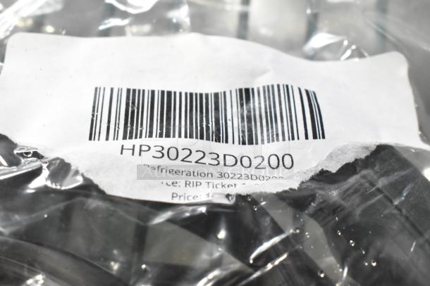 Clear plastic packaging with label HP30223D0200, containing scratch and dent items like gaskets. Barcoded tag visible.