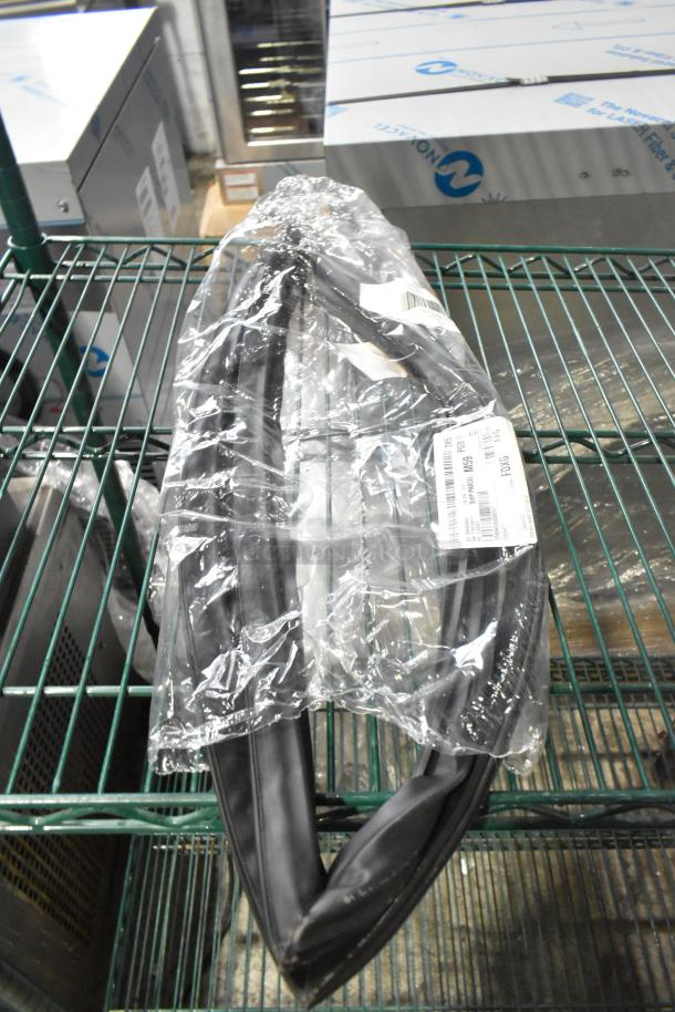 Brand new scratch and dent gaskets in plastic packaging on wire shelf, includes visible label with barcode and product details.