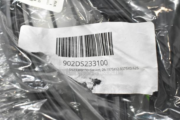 Barcode and label on packaging for DS233000100 gasket, size 26.1875x12.9375x0.625. Part of a scratch and dent auction lot.