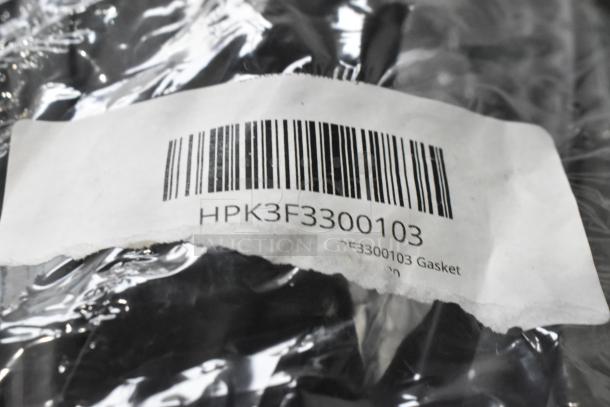 Barcode label on plastic packaging displaying "HPK3F3300103" and "Gasket" for a new auction item set.